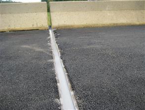 Expansion joint sealed using Belzona 4521 (Magma-Flex Fluid) whilst minimizing traffic disruption